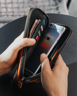 NewBring da hộ chiếu túi dài tay túi nam dây kéo túi xách hộ chiếu ví điện thoại di động ví nam