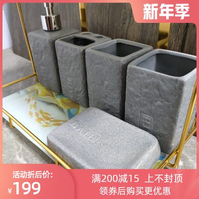 Phòng tắm lớn nhà vệ sinh kệ mỹ phẩm gia dụng đơn giản Bắc Âu gửi gốm sứ phòng tắm bộ năm mảnh