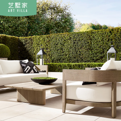 Bàn ghế sofa bằng gỗ tếch đặt trong sân vườn , đơn giản, chống thấm nước.