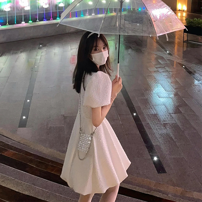 Xiaoyu MONA là chiếc váy trắng duy nhất của nữ mùa hè ngọt ngào bướm ngắn phần váy trắng nhỏ cô gái váy ngắn