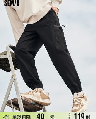 Bán quần yếm của nam giới 2022 mùa xuân màu đen cotton rộng rãi quần thể thao quần legging quần âu quần nam