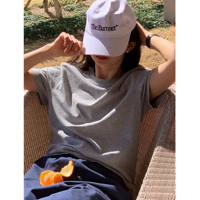 Hàn Quốc the barnet tám sữa tối giản màu rắn hoang dã cổ tròn rộng rãi áo thun nữ ngắn tay