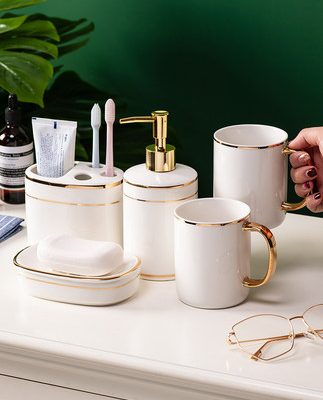 Bộ rửa sang trọng nhẹ Phòng tắm gốm sứ sáng tạo năm mảnh Phòng tắm Bắc Âu cung cấp cho nhà đám cưới bộ răng nước súc miệng cốc