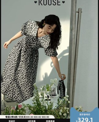 Màu rộng cổ áo búp bê Pháp dài màu đen váy hoa nữ 2022 mới tính khí mùa hè váy dài