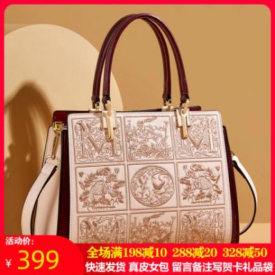 Túi 20221 túi xách nữ mùa xuân và mùa hè mới thêu niche túi xách mẹ trung niên tote nổ mô hình ánh sáng sứ giả sang trọng