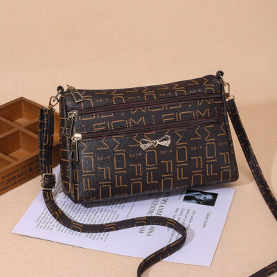 Túi xuân hè mới Túi Messenger phiên bản Hàn Quốc chất liệu hoa mẹ trung niên túi đeo vai chạy sông hồ dạo phố túi xách nữ bán buôn