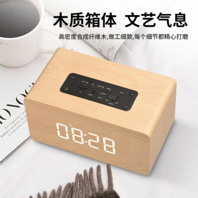 Di động bằng gỗ không dây quà tặng loa bluetooth đồng hồ điện thoại di động máy tính âm thanh nhỏ đồng hồ báo thức đài phát thanh công suất cao