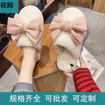 Dép bông ins thời trang trái tim bé gái thu đông trong nhà lót nhung giữ ấm phiên bản hàn quốc giày lông nơ ngọt ngào