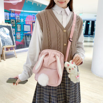Bán buôn túi học sinh bé gái 2023 mới túi bé gái dễ thương hoạt hình thỏ búp bê Messenger túi vuông nhỏ