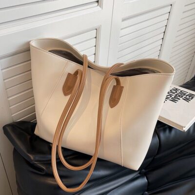 Hồng Kông mua túi sức chứa lớn 2023 túi đeo vai cầm tay phong cách mới cho nữ túi tote đi làm túi xách mới