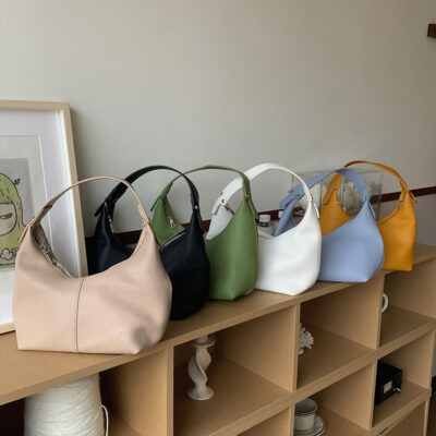 Túi xách nữ nhỏ 2023 mới mùa thu đông xách tay một vai phiên bản Hàn Quốc màu tương phản túi sát nách bánh bao da pu mềm đơn giản