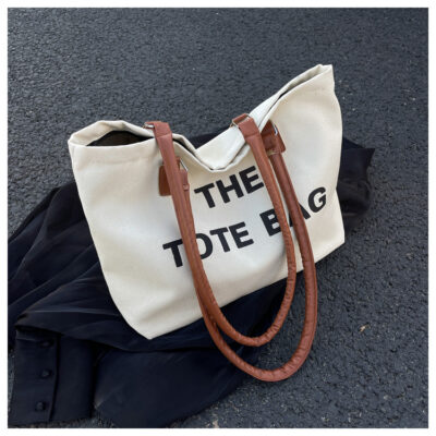 Túi vải canvas dung tích lớn nữ 2023 phong cách nước ngoài mới túi đeo vai thời trang kết cấu thường ngày in chữ túi xách