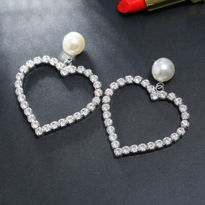 Hoa tai thời trang châu Âu và châu Mỹ ins lưới màu đỏ S925 kim bạc tính khí hợp thời trang quạt rỗng tình yêu rhinestone ngọc trai phóng đại bông tai