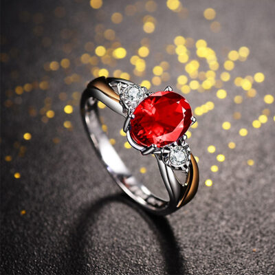 Nhẫn tourmaline đỏ hình bầu dục bốn móng Châu Âu và Mỹ mô phỏng sang trọng thấp nhẫn kim cương nữ tính khí cổ điển trang sức đơn giản bán buôn