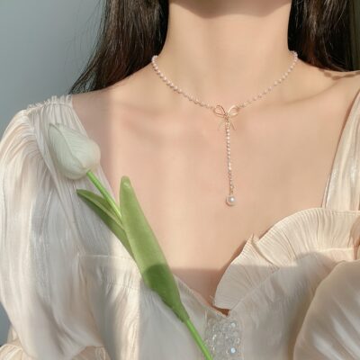 Tiên thích hợp choker bow vòng cổ ngọc trai nữ ins gió lạnh tính khí đơn giản xương quai xanh chuỗi vòng cổ nữ
