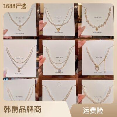Vòng cổ ngọc trai zircon tinh tế mới của Hàn Quốc phù hợp với tất cả phụ nữ ánh sáng sang trọng thích hợp chuỗi xương đòn tình yêu chuỗi vòng cổ màu đỏ cùng phong cách