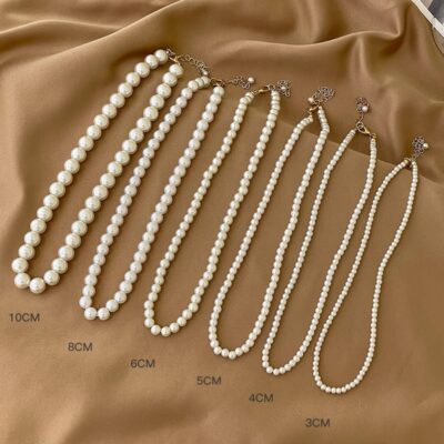 Khí chất dịu dàng vòng cổ ngọc trai nữ mùa hè ánh sáng retro sang trọng thích hợp vòng cổ lưới màu đỏ cảm giác cao cấp chuỗi xương đòn xếp chồng lên nhau