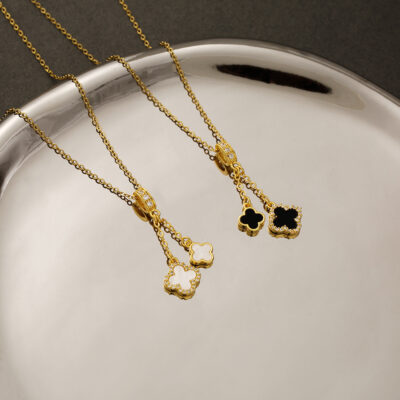 Wen Jian thời trang và thanh lịch bằng thép titan vòng cổ cỏ bốn lá nữ khảm zircon tua cỏ bốn lá mặt dây chuyền quyến rũ dây chuyền xương đòn