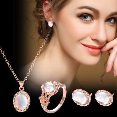 Bộ trang sức xu hướng kết hợp đá quý rực rỡ Bộ thời trang Âu Mỹ mới ba mảnh bông tai vòng cổ bộ nhẫn