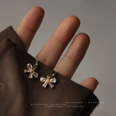 Đôi mắt sáng mạ vàng thật 14K bông tai zircon nơ thiết kế sáng tạo phiên bản Hàn Quốc bông tai nhà máy Hàn Quốc ins