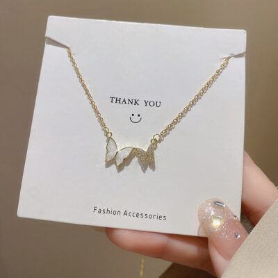 Mới của Hàn Quốc giọt dầu zircon đôi bướm mặt dây chuyền nữ thiết kế ngách cao cấp thép titan xương đòn dây chuyền cổ liên kết