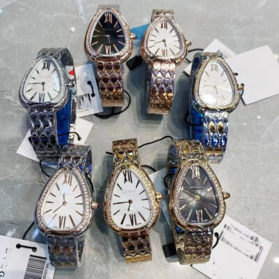 Thương hiệu đồng hồ nữ hình con rắn phiên bản Hàn Quốc theo phong cách đơn giản khí chất retro ánh sáng sang trọng dây thép xuyên biên giới đồng hồ thạch anh