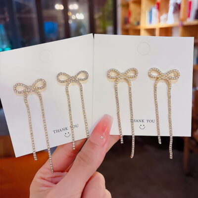 S925 kim bạc Hàn Quốc phóng đại lưới nơ đỏ tua dài bông tai đơn giản khí chất bông tai bông tai ngọc trai nữ