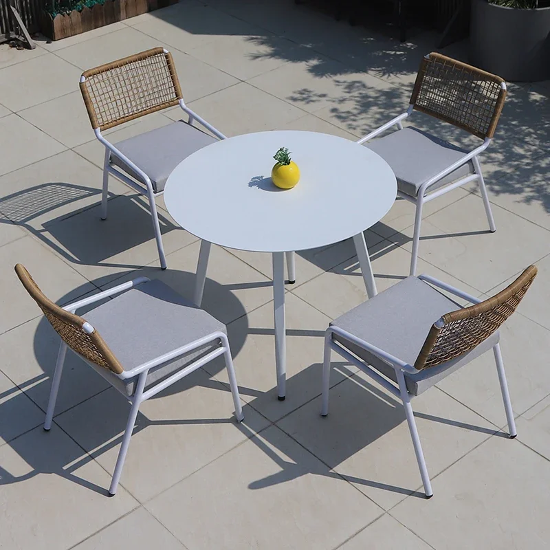 Outdoor-rattan-table-and-chair-combination-simple-garden-rooftop-high-end-balcony-Western-restaurant-leisure-table-3.webp