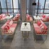 Bàn ghế Bắc Âu sắt rèn sofa ghế Bàn ghế cà phê quần áo Quán trà sữa đơn và đôi sofa nhỏ ins phong cách lưới màu đỏ