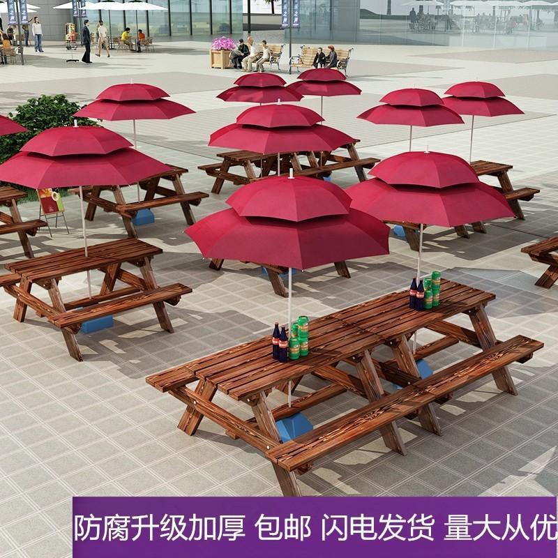 Bàn ghế ngoài trời trà sữa quán cà phê sân căng tin ngoài trời Bàn ghế ăn liền công viên có dù gỗ nguyên khối chống ăn mòn Bàn ghế ngoài trời trà sữa quán cà phê sân căng tin ngoài trời Bàn ghế ăn liền công viên có dù gỗ nguyên khối chống ăn mòn