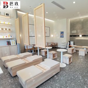 Bàn ghế Quán cà phê quán trà sữa ghế sofa lưới màu đỏ cửa hàng tráng miệng cửa hàng bánh dải dài kho phân gỗ dựa vào tường Bàn ghế - Hình 3